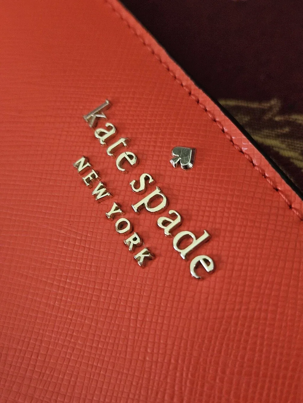 Kate Spade New York coral orange Saffiano leather continental wallet